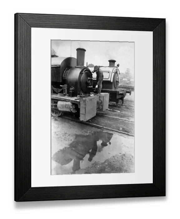 Framed Print : The final touches being made to a steam engine before the public arrive at Marley Hill