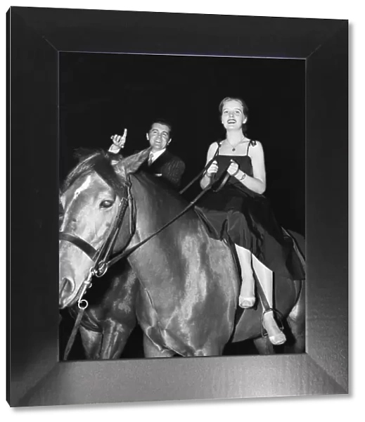 British musician Ronnie Ronalde and Bride Corsie on horseback