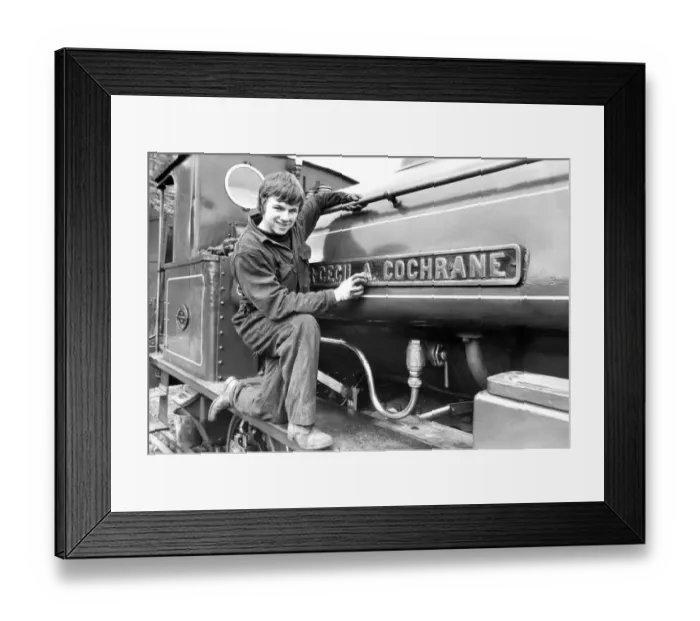 Framed Print : Alan Hogg, aged 13, from Heaton, cleans up the sir Cecil A