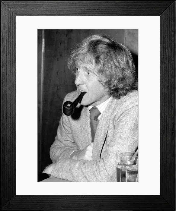 Framed Print : Rod Hull seen here taking a rest from emu at the opening of the Winchester Homecraft