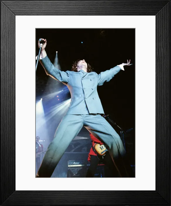 Framed Print : Michael Hutchence lead singer of INXS, pictured in concert - X Factor World Tour -
