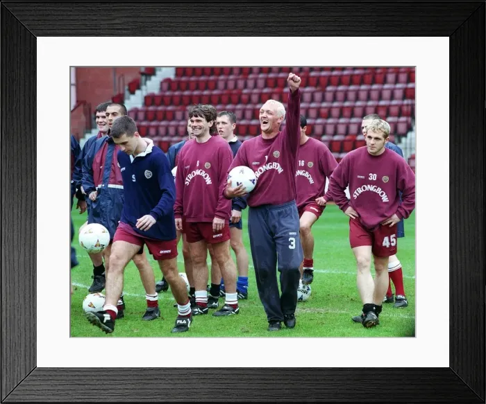 Framed Print : Heart of Midlothian footballers during a training session ahead of their Scottish Cup