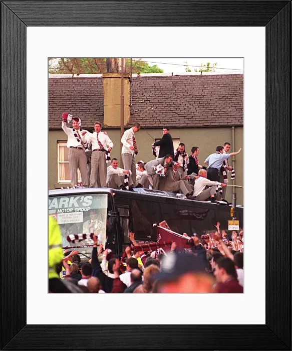 Framed Print : Heart of Midlothian football players waves to fans who have lined the streets of Framed Print : Heart of Midlothian football players waves to fans who have lined the streets of