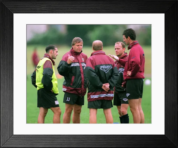Framed Print : Heart of Midlothian football manager Jim Jefferies with his players during a training