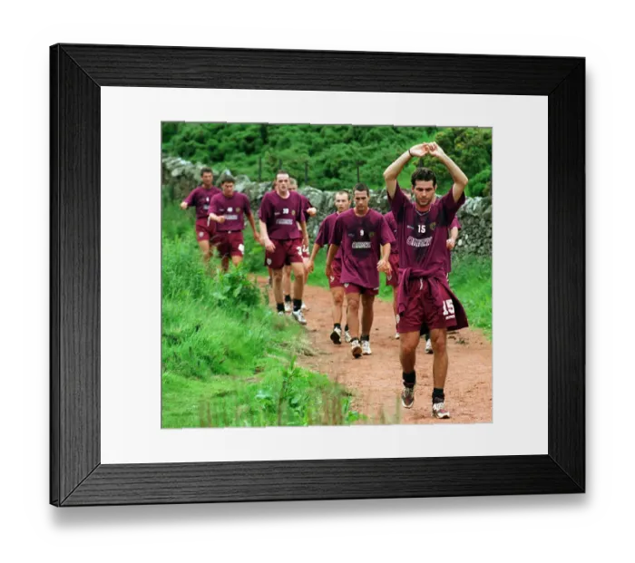 Framed Print : Heart of Midlothian players being led by Stephane Adame during the first day of training Framed Print : Heart of Midlothian players being led by Stephane Adame during the first day of training