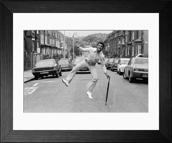 Framed Print : John Conteh celebrates after winning both British and European Commonwealth titles in his