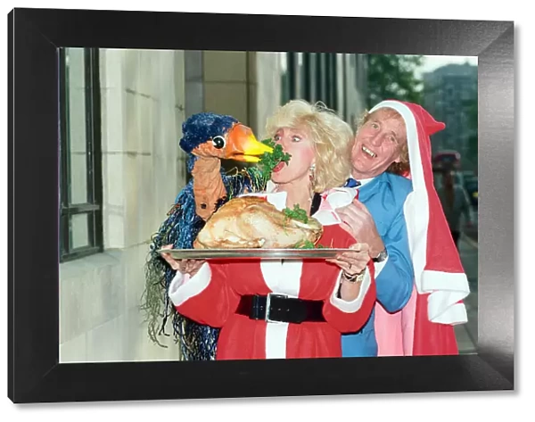 Rod Hull and Emu seen here attacking comedian Janet Brown during a British Turkey