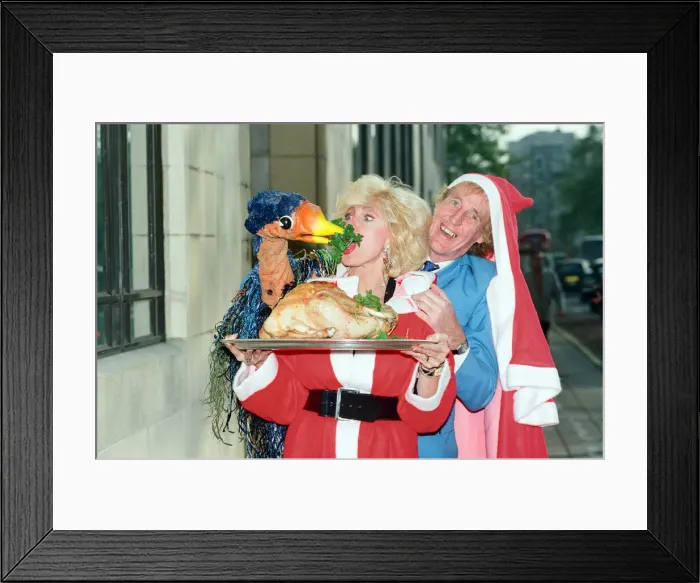 Framed Print : Rod Hull and Emu seen here attacking comedian Janet Brown during a British Turkey Framed Print : Rod Hull and Emu seen here attacking comedian Janet Brown during a British Turkey