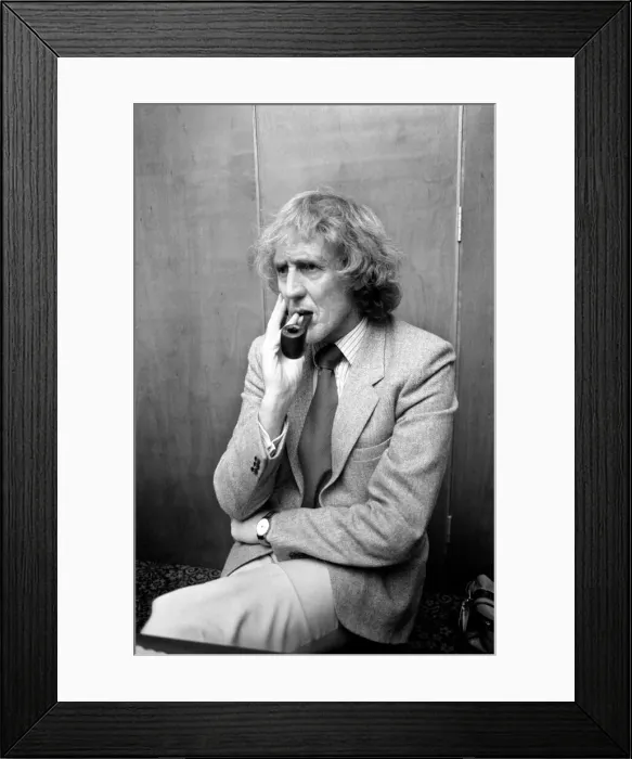 Framed Print : Rod Hull seen here taking a rest from emu at the opening of the Winchester Homecraft