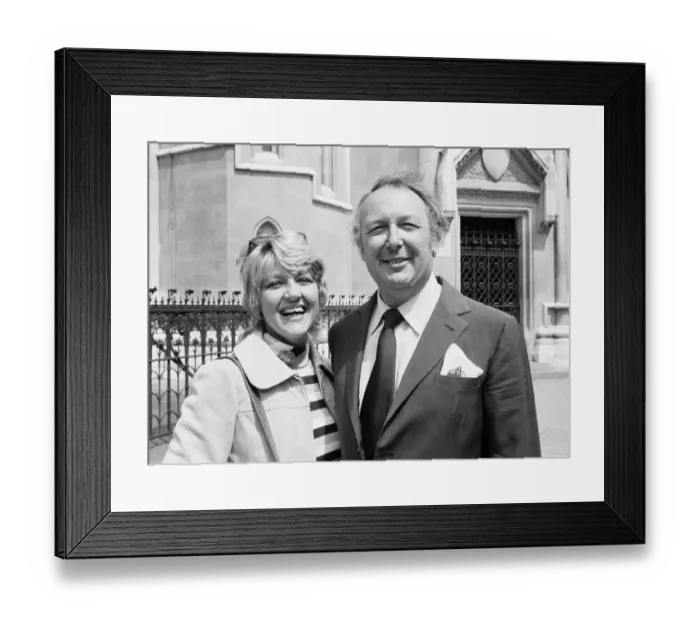 Framed Print : Head of Laker Airways Freddie Laker with his wife Patricia outside London law courts as