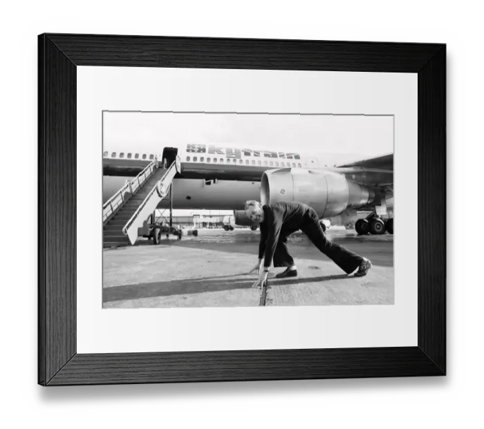 Framed Print : Head of Laker Airways Freddie Laker in jubilant mood on the runway at Gatwick airport Framed Print : Head of Laker Airways Freddie Laker in jubilant mood on the runway at Gatwick airport