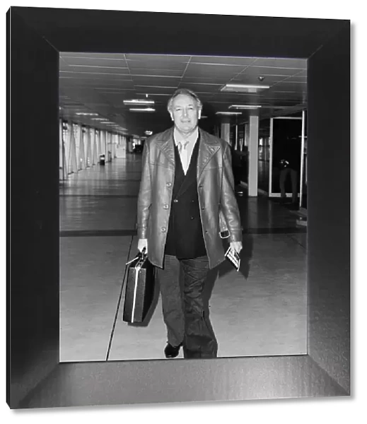 Freddie Laker head of Laker Airways, pictured arriving at Heathrow airport, London