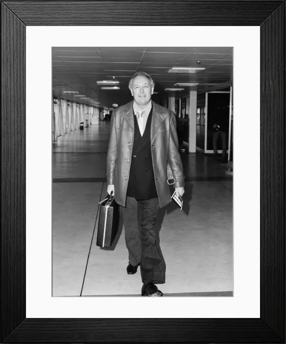 Framed Print : Freddie Laker head of Laker Airways, pictured arriving at Heathrow airport, London Framed Print : Freddie Laker head of Laker Airways, pictured arriving at Heathrow airport, London