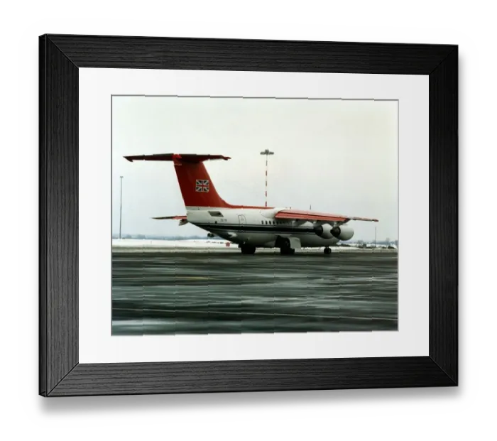 Framed Print : The RAF Queens Flight BAe 146-C1 (ZE701) aircraft leaves Newcastle Airport taking