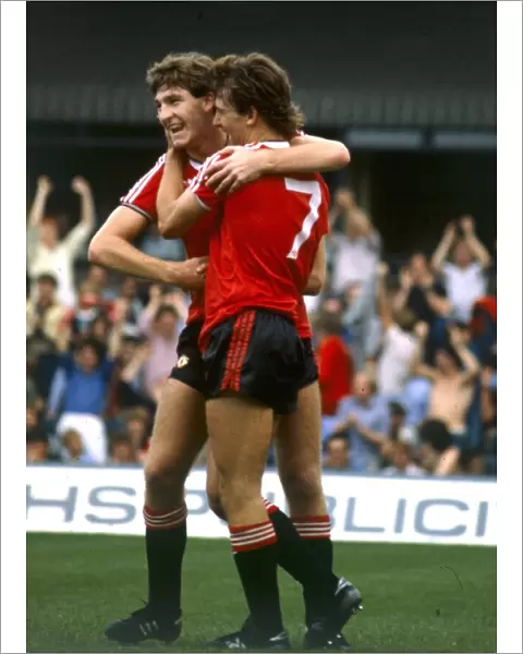 Manchester United players Norman Whiteside and Bryan Robson (7