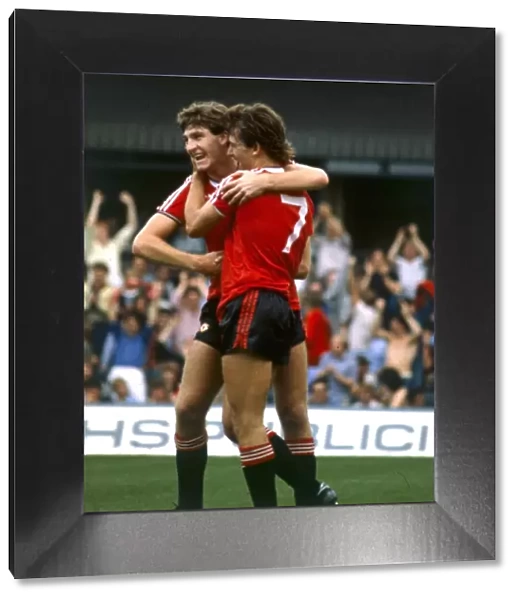Manchester United players Norman Whiteside and Bryan Robson (7