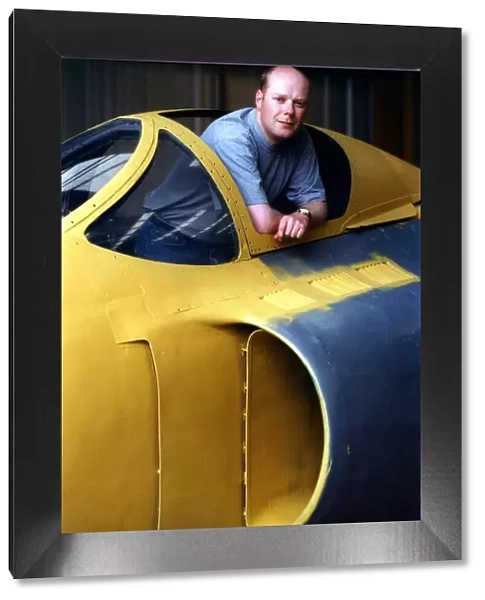 Craig Blundred, from the North East Aircraft Museum, pictured with the Supermarine Swift
