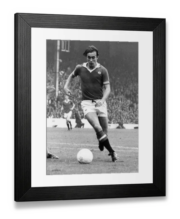 Framed Print : Manchester United footballer Sammy McIlroy on the ball during the League Division One Framed Print : Manchester United footballer Sammy McIlroy on the ball during the League Division One