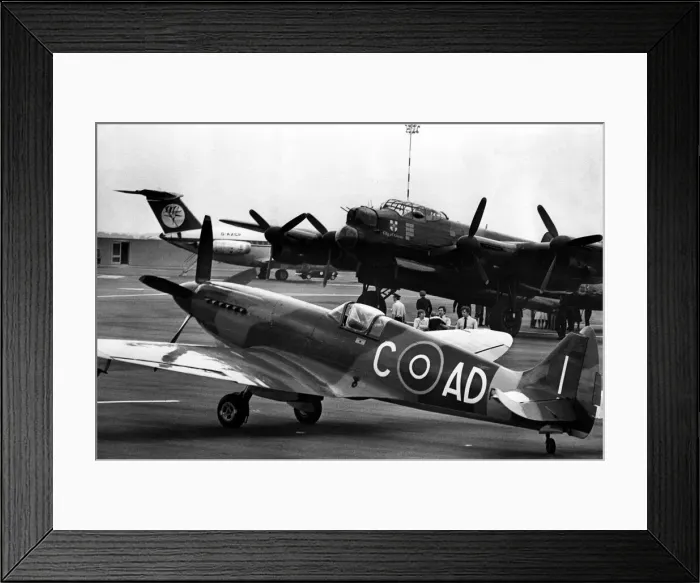 Framed Print : A Supermarine Spitfire Mk PRXIX and Avro Lancaster of the Battle of Britain Memorial Framed Print : A Supermarine Spitfire Mk PRXIX and Avro Lancaster of the Battle of Britain Memorial