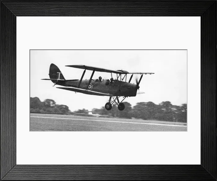 Framed Print : A de Havilland Tiger Moth landing on an airfiield. 02 / 07 / 1977 Framed Print : A de Havilland Tiger Moth landing on an airfiield. 02 / 07 / 1977