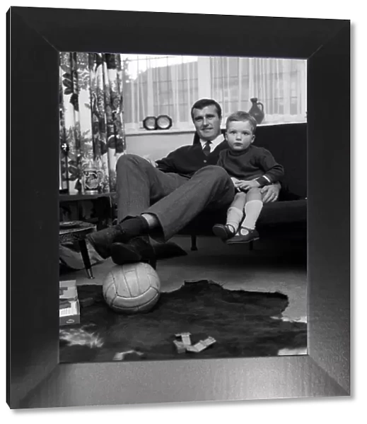Noel Cantwell of Manchester United at home with son Robert Cantwell