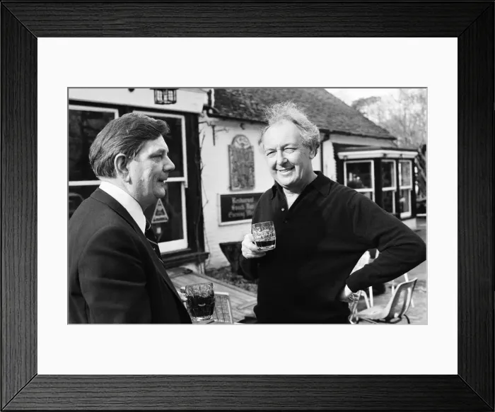 Framed Print : Freddie Laker, enjoying a quick half pint in the garden of his local pub in the village Framed Print : Freddie Laker, enjoying a quick half pint in the garden of his local pub in the village