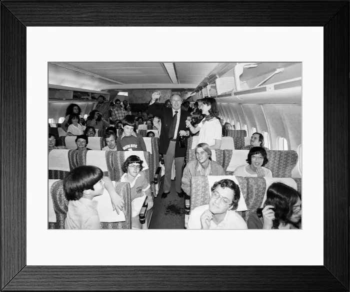 Framed Print : Head of Laker Airways Freddie Laker mingles with passengers on board his translatlantic Framed Print : Head of Laker Airways Freddie Laker mingles with passengers on board his translatlantic