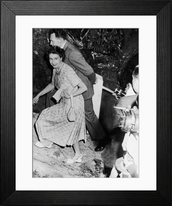 Framed Print : The Queen climbing over rocks to see a cave in Waitomo, New Zealand. 11th Jan 1954 Framed Print : The Queen climbing over rocks to see a cave in Waitomo, New Zealand. 11th Jan 1954