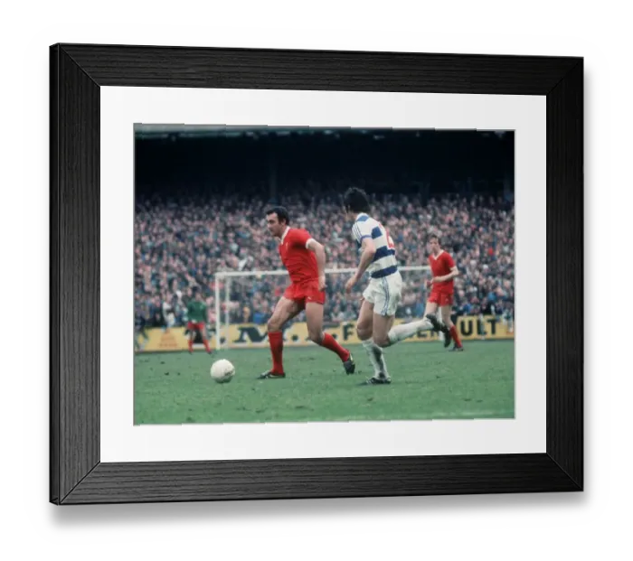 Framed Print : Liverpool footballer Ray Kennedy running with the ball during the League Division One Framed Print : Liverpool footballer Ray Kennedy running with the ball during the League Division One