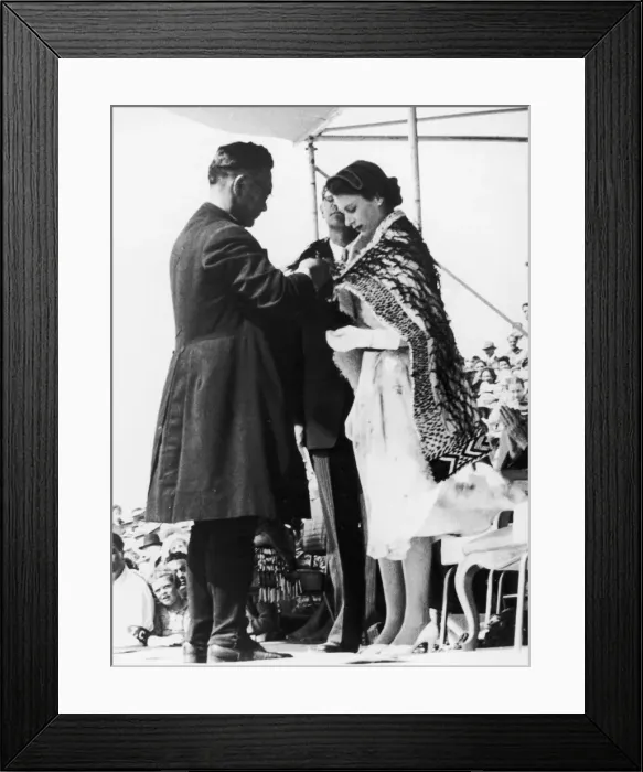 Framed Print : The Queen has a Maori cloak placed around her shoulders by the bishop of Aotearoa in Framed Print : The Queen has a Maori cloak placed around her shoulders by the bishop of Aotearoa in