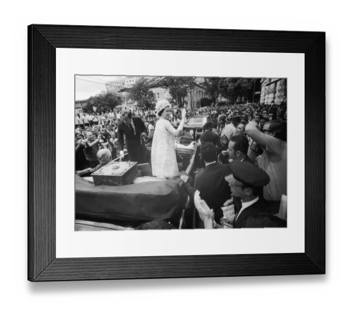 Framed Print : Royal Tours, Salvador, Brazil. Queen Elizabeth II waves from ther motorcade
