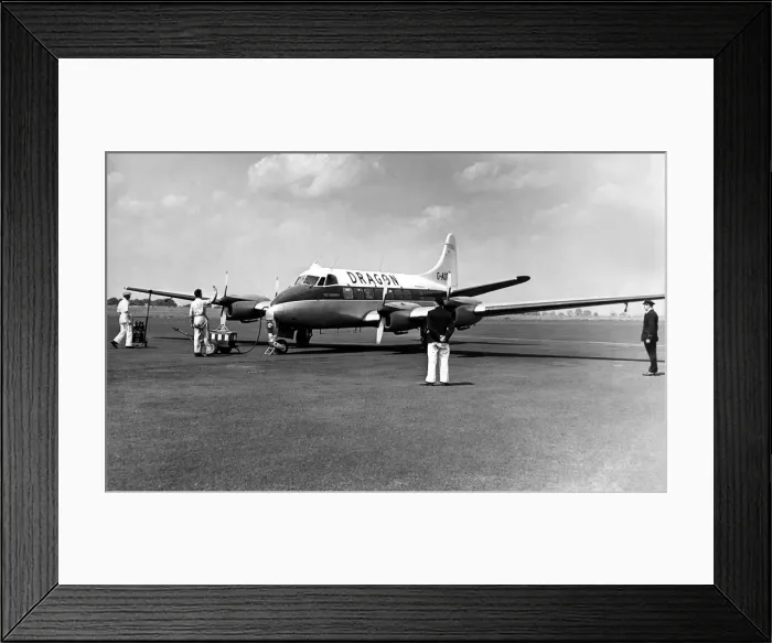 Framed Print : Pictured is a de Havilland Heron propeller-driven small airliner operated by Dragon Framed Print : Pictured is a de Havilland Heron propeller-driven small airliner operated by Dragon
