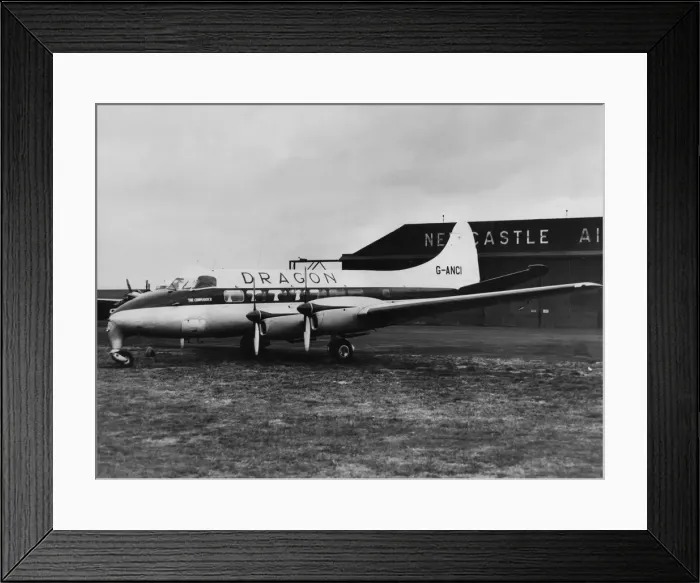 Framed Print : A de Havilland Heron propeller-driven small airliner operated by Dragon Airways