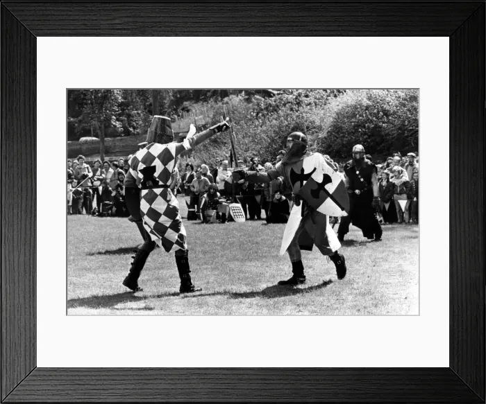 Framed Print : Battle re-enactments - A display of medieval combat at the formal opening of Prudhoe