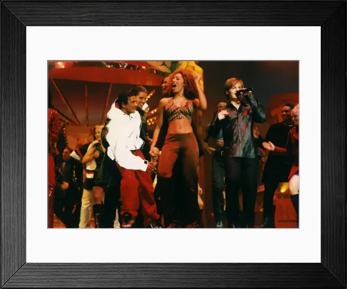 Framed Print : Spice Girl Mel B dancing and singing on stage at the 1996 Smash Hits Pole Winners Party Framed Print : Spice Girl Mel B dancing and singing on stage at the 1996 Smash Hits Pole Winners Party