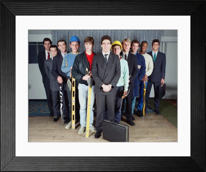 Framed Print : Members of Sutton United football club dressed in their everyday work clothes Framed Print : Members of Sutton United football club dressed in their everyday work clothes