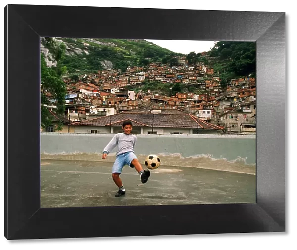 Brazil World Cup feature in Rio De Janeiro. 12 year old Vitor Pedrosa from the Dona