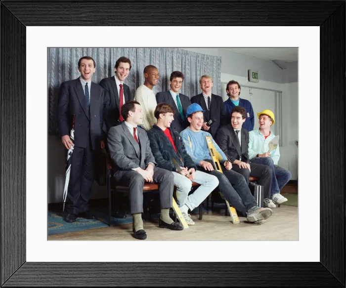 Framed Print : Members of Sutton United football club dressed in their everyday work clothes Framed Print : Members of Sutton United football club dressed in their everyday work clothes
