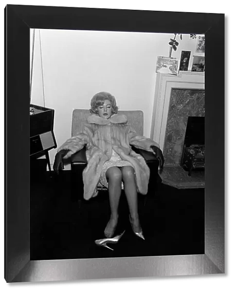 Singer Kathy Kirby singer asleep in a chair. Circa January 1964