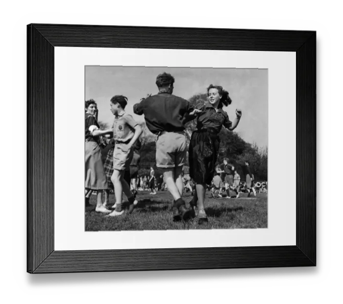 Framed Print : The Woodcraft Folk May Day Rally in a playing field next to Regents Park Framed Print : The Woodcraft Folk May Day Rally in a playing field next to Regents Park