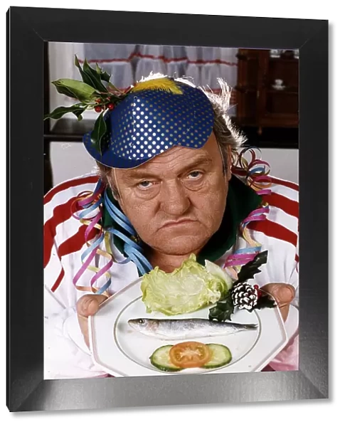Les Dawson comedian with his christmas dinner