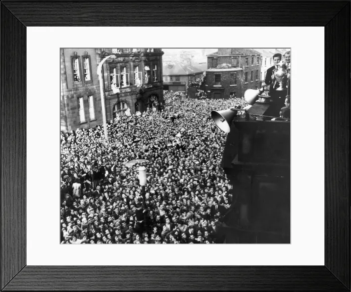 Framed Print : Captain D Turner and coach K Traill holf the cup aloft to the gather fans below