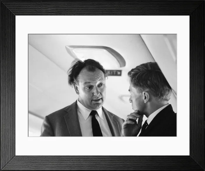 Framed Print : Airline chief Freddie Laker, head of Laker Airways, pictured talking to one of his staff Framed Print : Airline chief Freddie Laker, head of Laker Airways, pictured talking to one of his staff