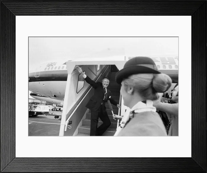 Framed Print : Head of Laker Airways Freddie Laker in jubilant mood at Gatwick airport on the day of