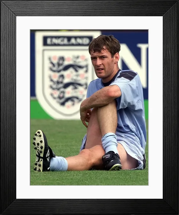 Framed Print : Chris Sutton England Player, takes a break during training session Framed Print : Chris Sutton England Player, takes a break during training session