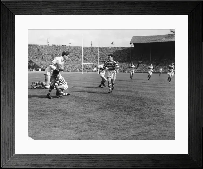 Framed Print : Halifax try to stem a St Helens attack during the Rugby League Cup Final at Wembley