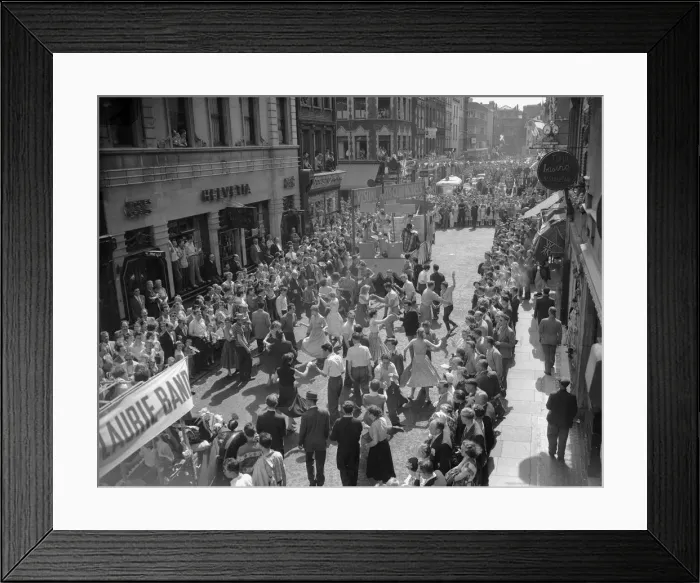 Framed Print : Crowds dancing in the street during the Soho Fair in Central London. 10th July 1955 Framed Print : Crowds dancing in the street during the Soho Fair in Central London. 10th July 1955
