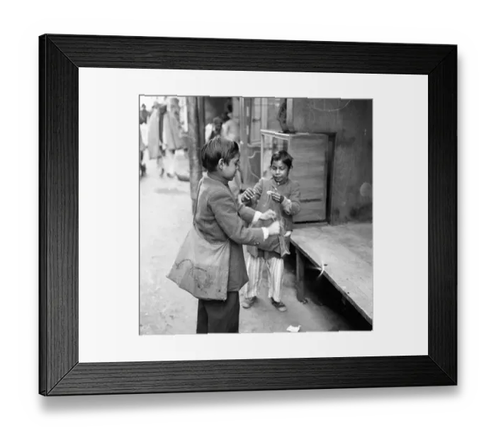 Framed Print : Street scenes, New Delhi, India, January 1961. Two young boys playing in the street Framed Print : Street scenes, New Delhi, India, January 1961. Two young boys playing in the street