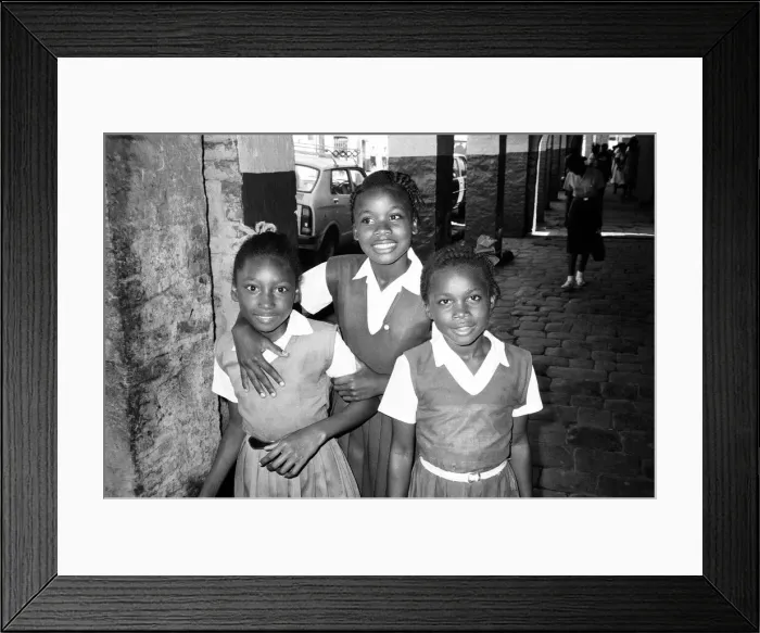 Framed Print : Children on their way to school in Kingston, Jamaica, January 1984 Framed Print : Children on their way to school in Kingston, Jamaica, January 1984