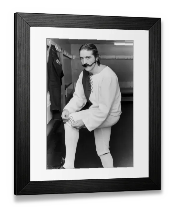 Framed Print : Everton footballer Bob Latchford tries out the strip which was worn by his team